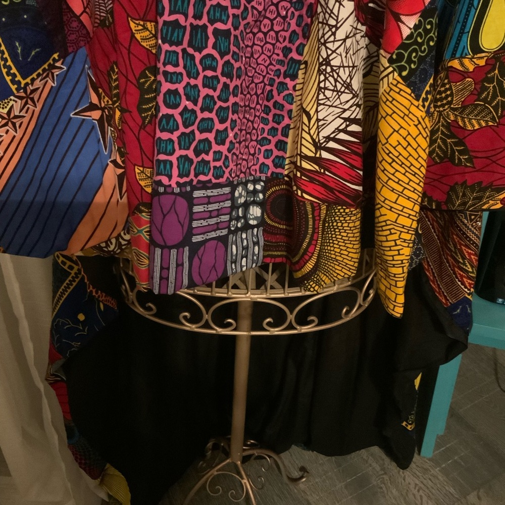 Women African patchwork poncho. She slips over the head.
